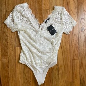 Medium women’s body suit